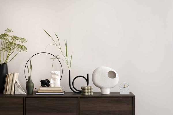 Comment choisir des boucles d'oreilles pendantes pour un visage rond?